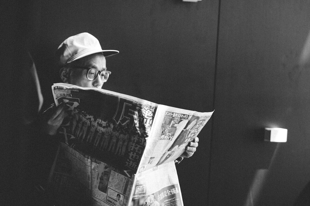 writer researching old newspapers
