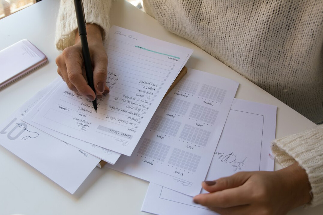 writer planning plot on paper