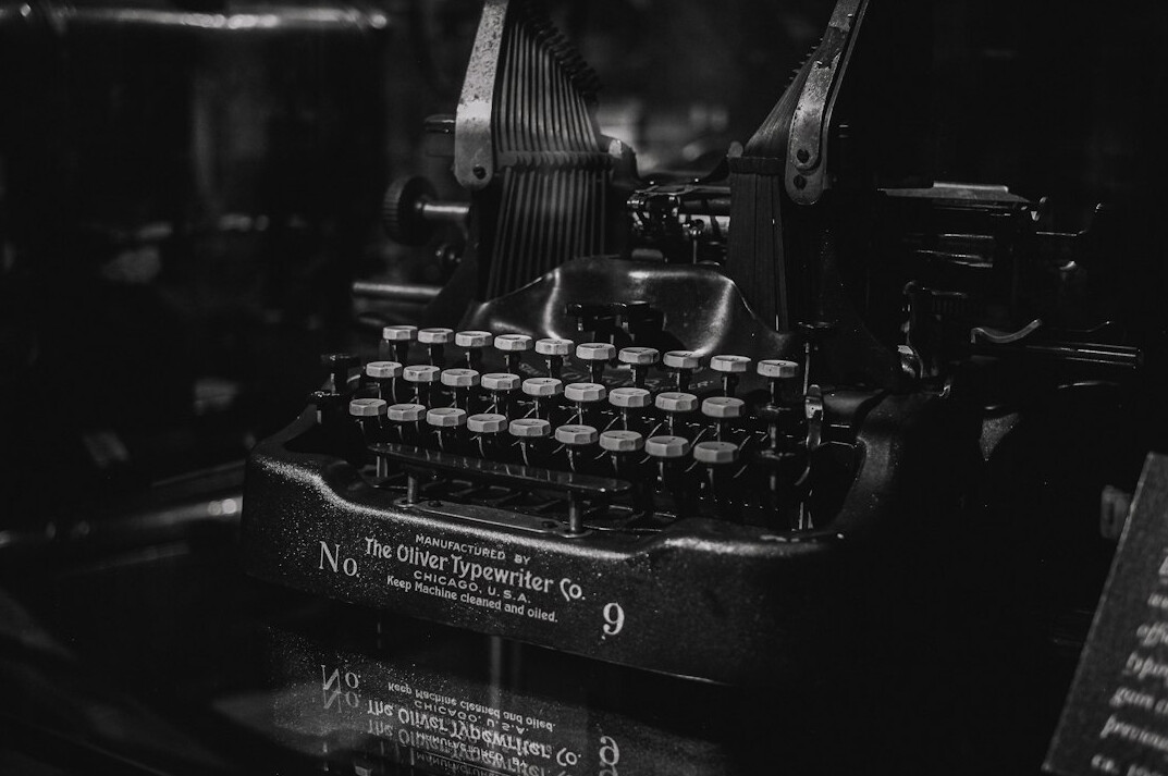 mysterious writer at typewriter