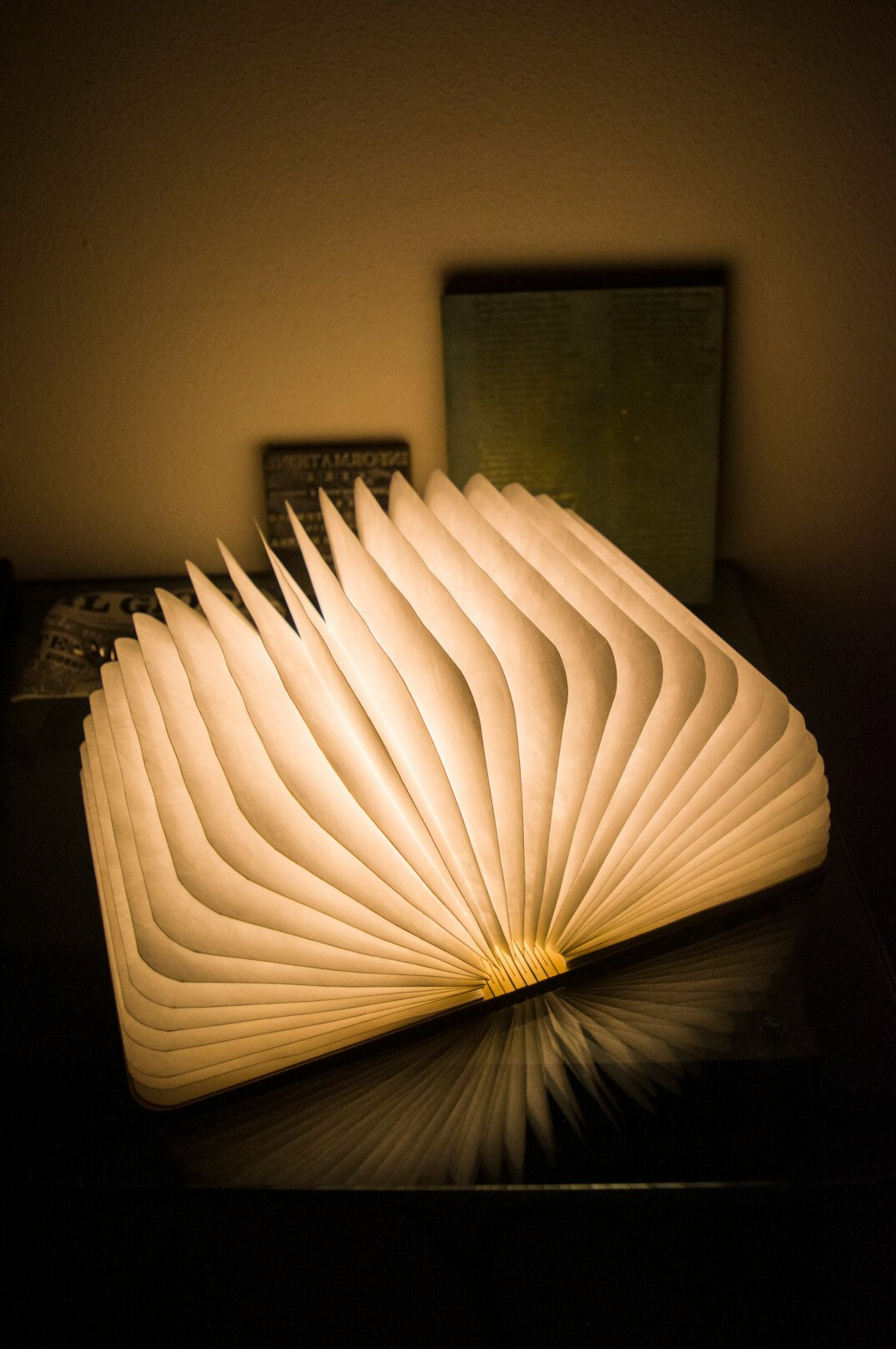 open book with lamp